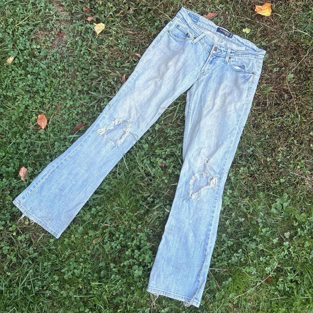 Levi’s low waisted size 3 distressed flare jeans